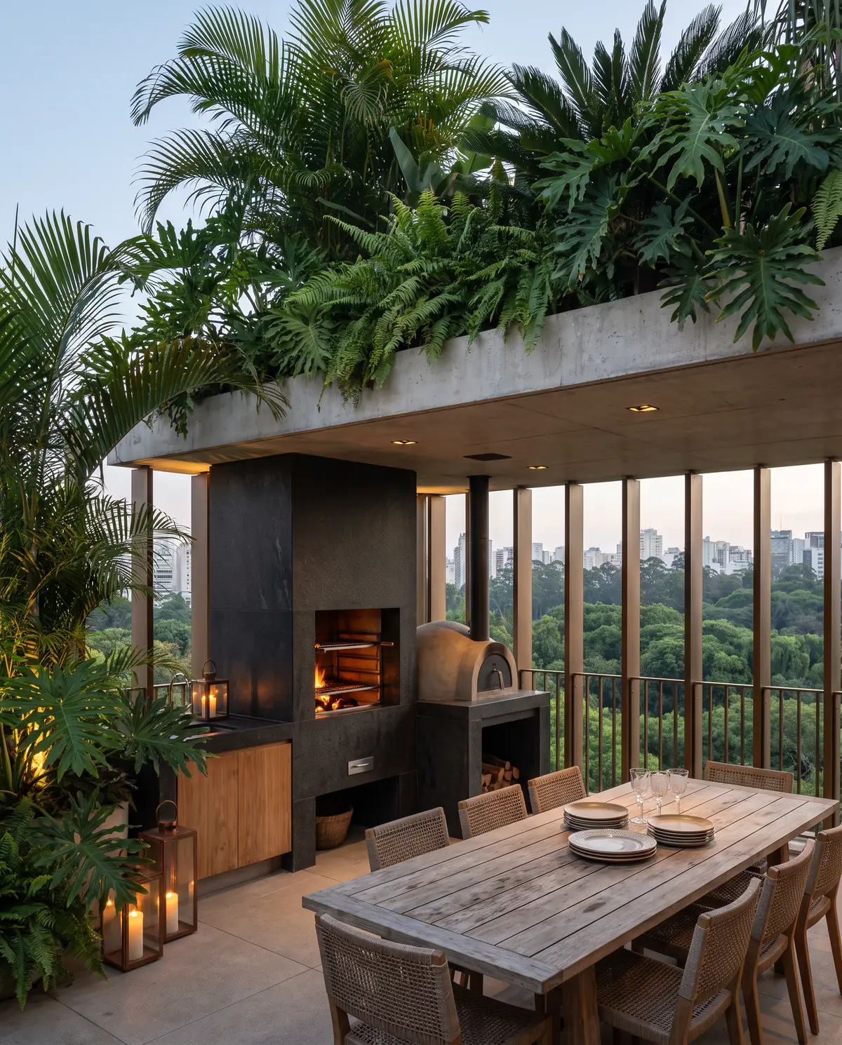 Terraço-jardim com churrasqueira, forno a lenha e mesa de madeira ao entardecer